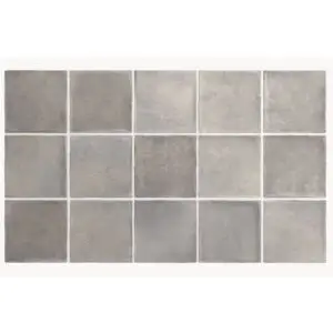 Grey square tiles arranged in a 4 by 5 grid across the surface, with subtle mottled texture.
