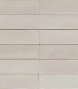 Beige rectangular wall tiles arranged in horizontal rows with a central vertical grout line.