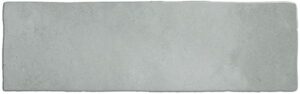 Rectangular light gray concrete slab with a rough, slightly textured surface.