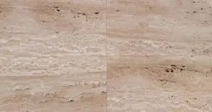 Beige marble/stone tiles with a vertical grout seam in the center.