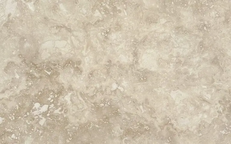 Beige marble texture with irregular veining and speckles.