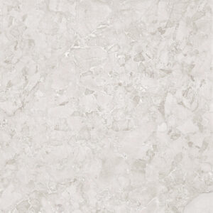 Light beige marble texture with subtle veining across the surface, a neutral background.