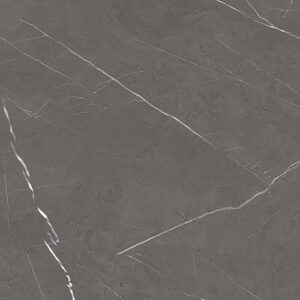 Close-up of a dark grey marble surface with white veins running diagonally across it